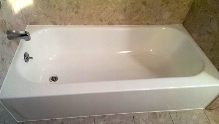 Bathtub reglazed in white